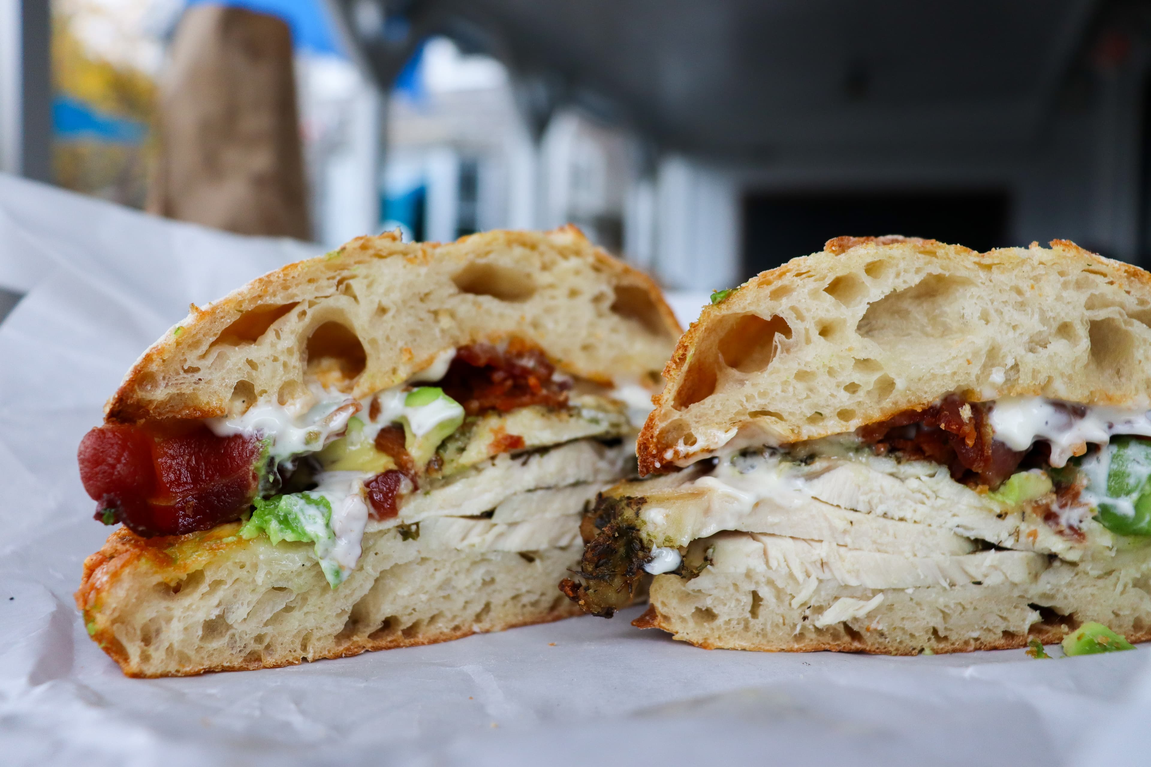 Signature chicken avocado and bacon sandwich, featured on Diners, Drive-Ins, and Dives.